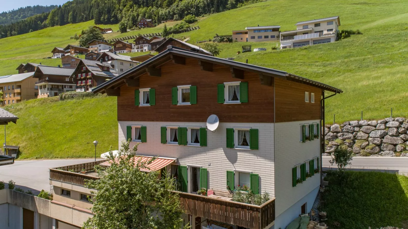 Ferienhaus Türtscher 1-Buitenkant zomer