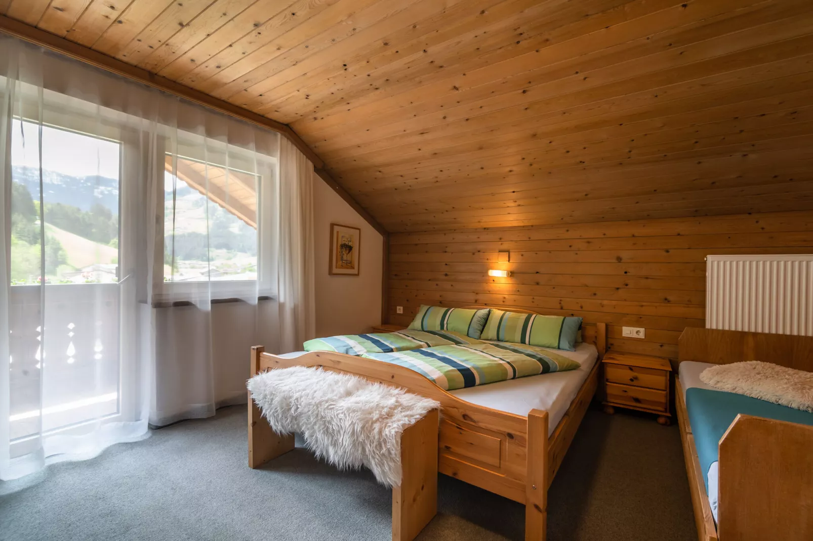 Mooi appartement in Zell am Ziller vlak bij de skibussen-Slaapkamer