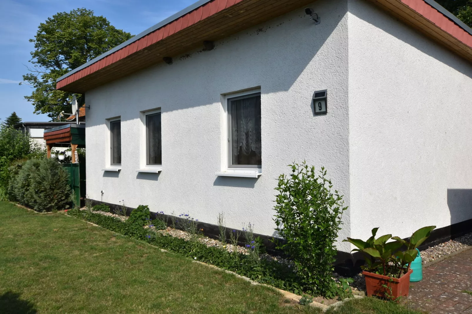 Haus an der Küstenbucht-Buitenkant zomer
