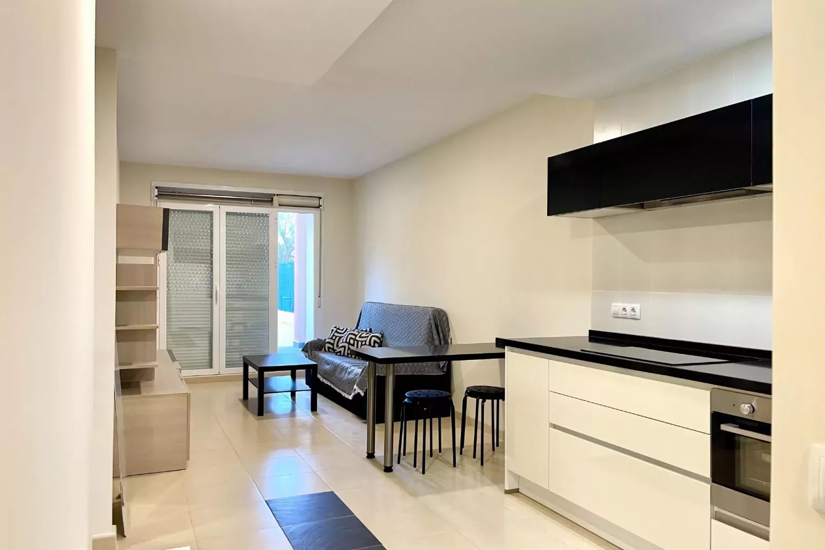 Apto con piscina en Vera playa - Woonkamer
