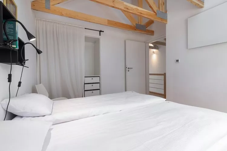Domy wakacyjne dla 2 osób nad jeziorem Wisełka-Slaapkamer