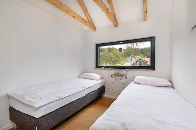 Dom wakacyjny dla 3 osób nad jeziorem Wisełka-Slaapkamer