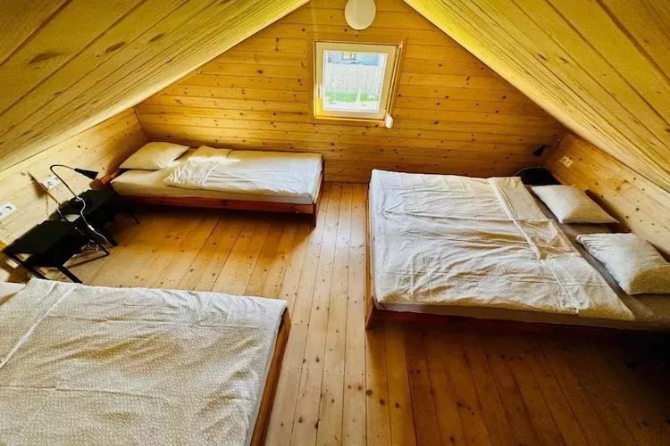 Domki wakacyjne dla 9 osób Mielenko-Slaapkamer