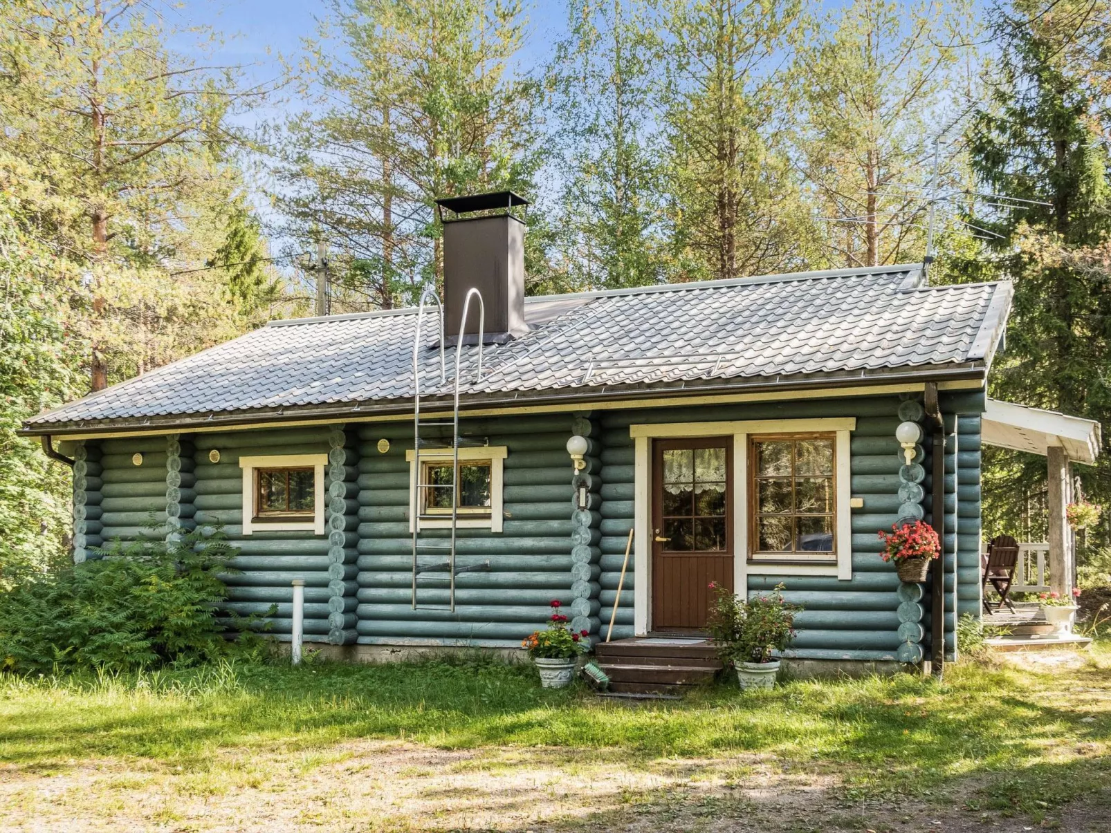 Huotarin mökki-Buiten