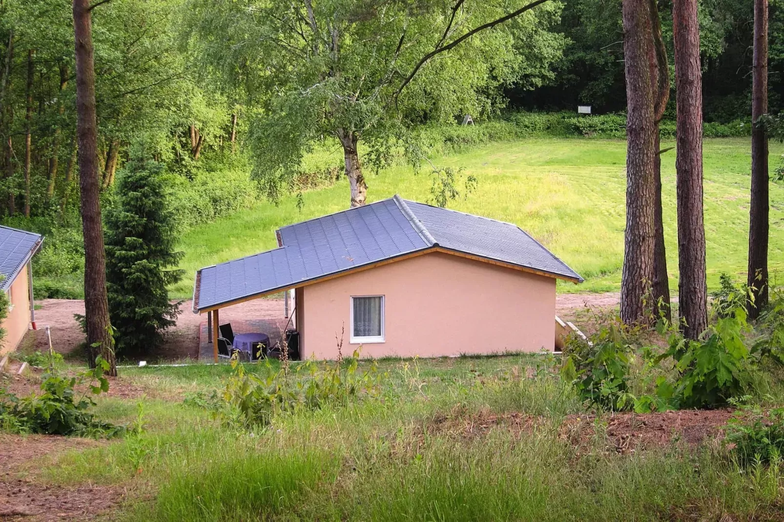 Bungalow deluxe 48 qm-Uitzicht zomer