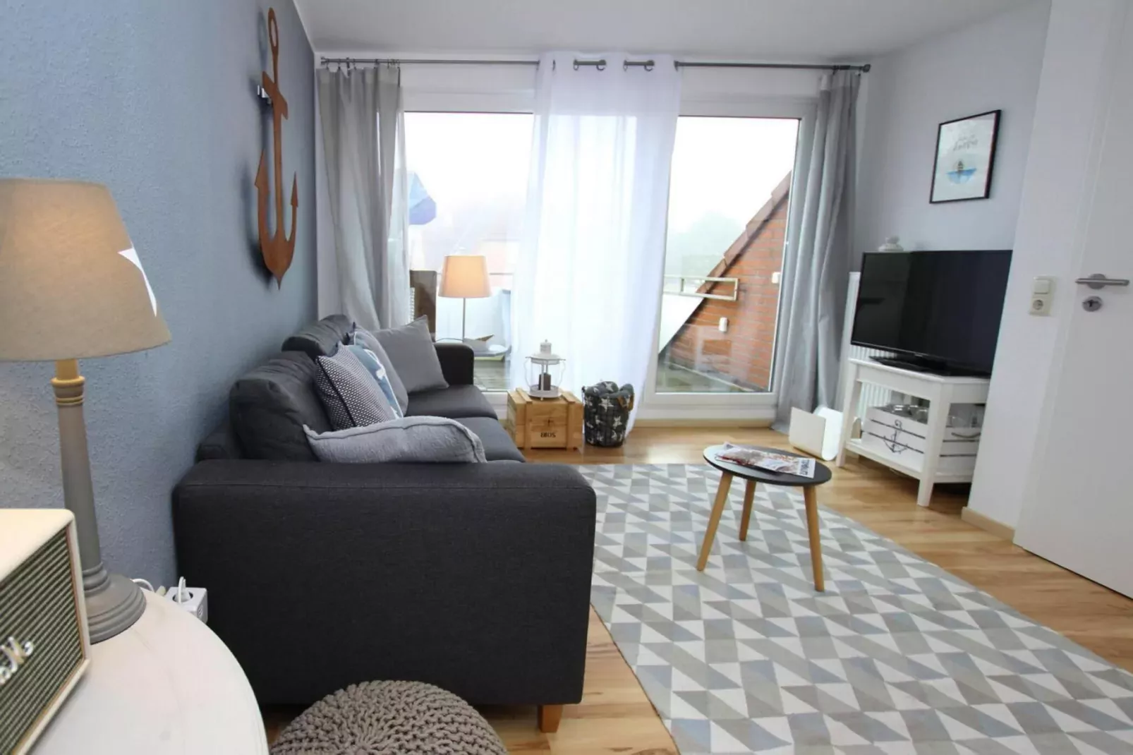 Ferienwohnung nordisch Garding-Woonkamer