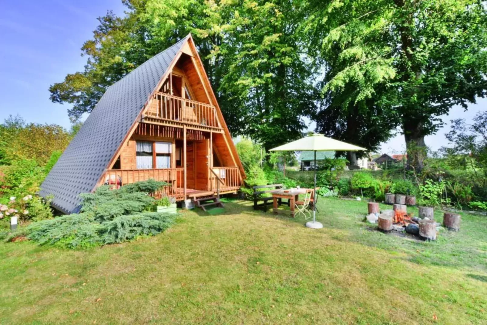 Domek letniskowy 70 m2 TYP B Osieki-Buitenkant zomer