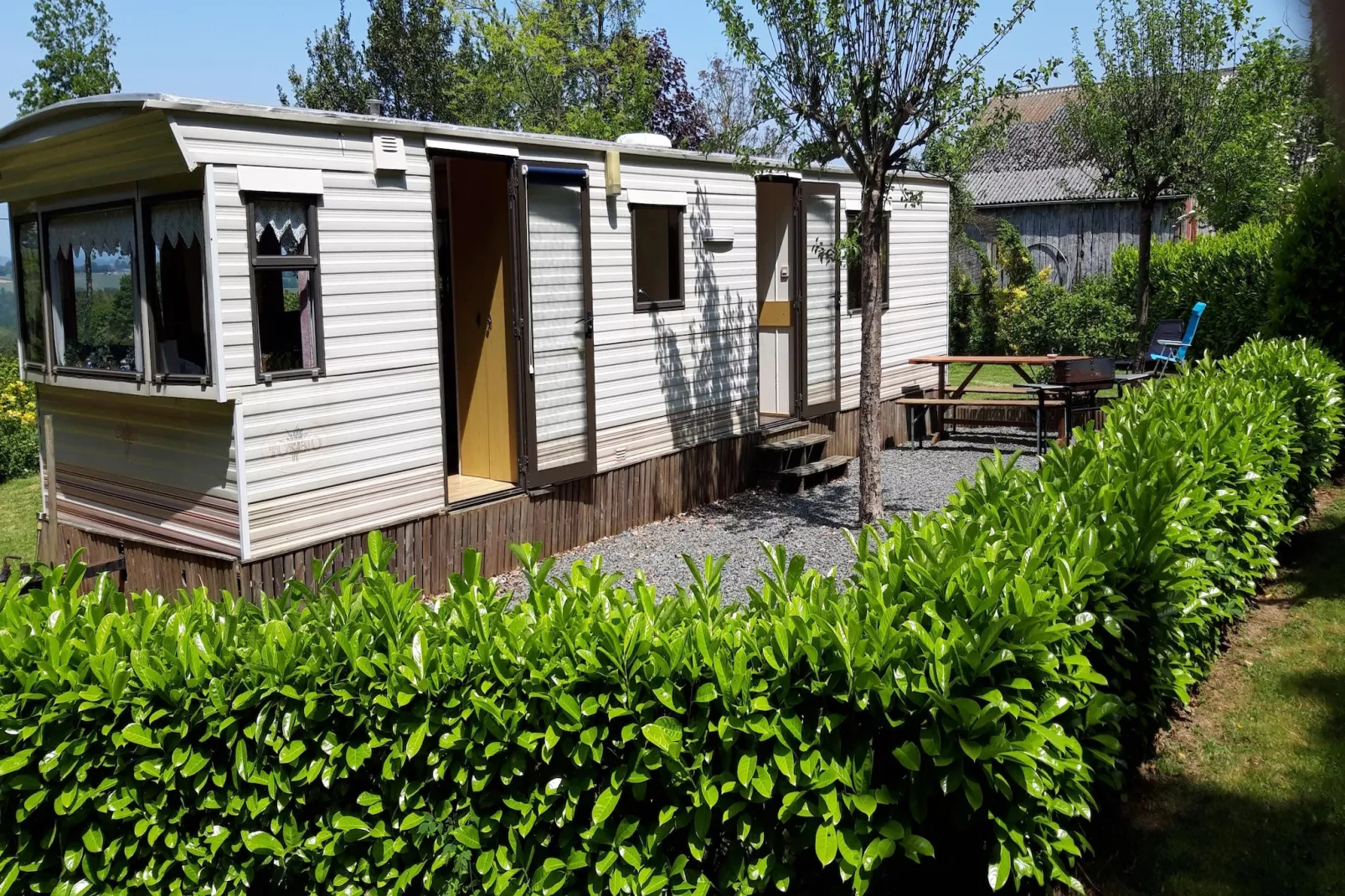 Mobil-home Grenterie-Buitenkant zomer