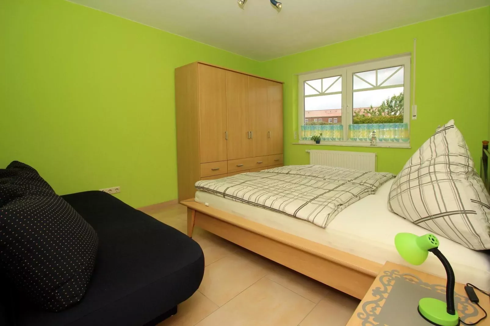 Große Ferienwohnung für 6 Personen mit Terrasse-Slaapkamer