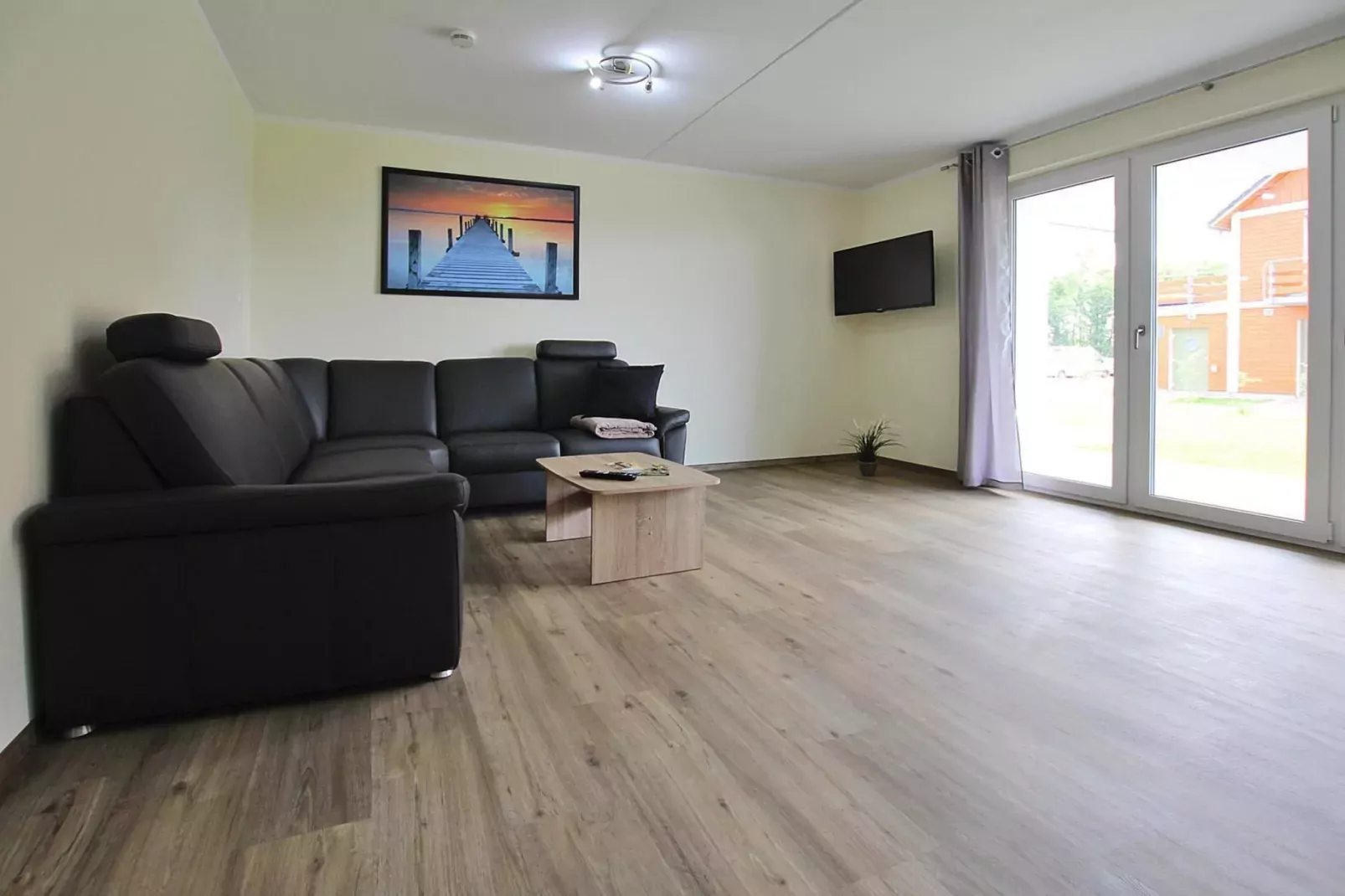 Apartment Hafenflair / Haus 3 EG-Wohnung 9 2 und 2 Personen-Woonkamer
