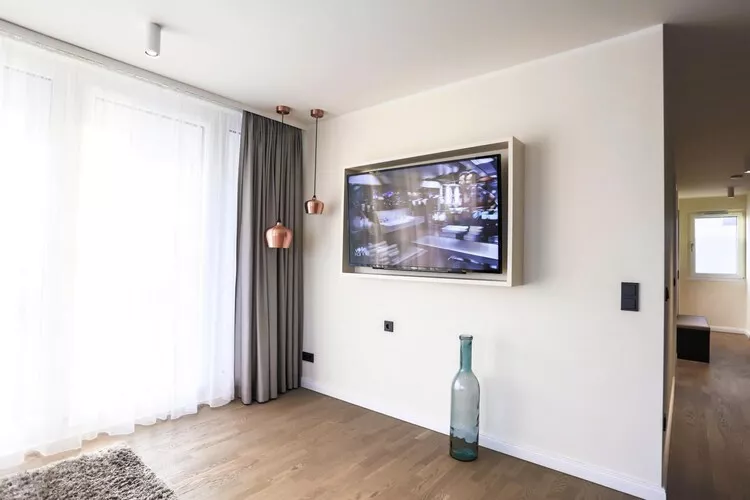 Apartments im MAREMÜRITZ Yachthafen Resort & Spa / Anker Penthouse Suite 2 Personen und 2 Kinder 3-15 Jahre-Woonkamer