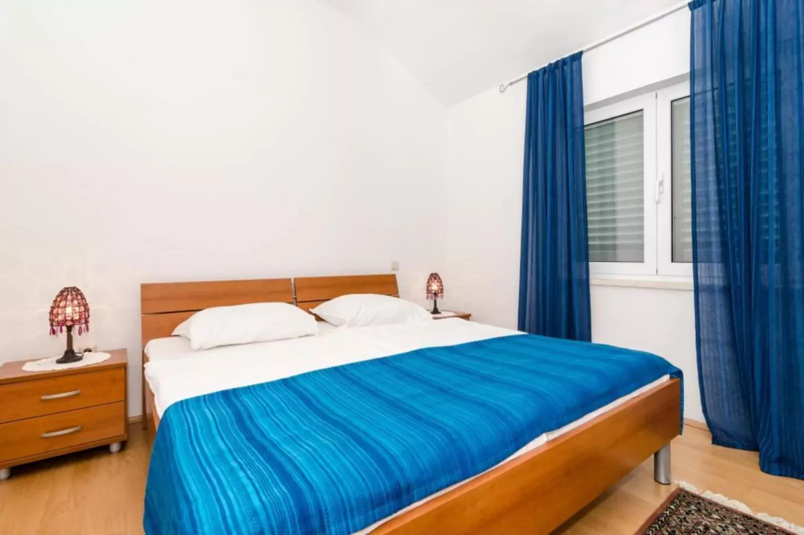 Apartments Peco - One Bedroom Apartment with Patio and Side Sea View-Slaapkamer