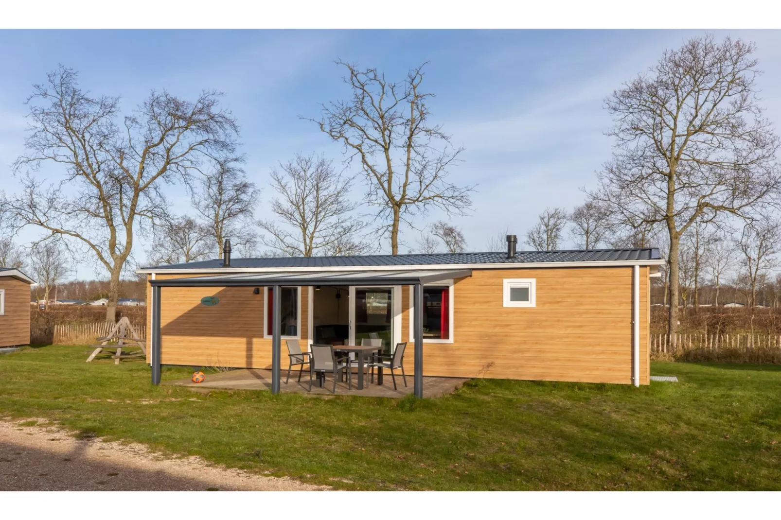 Chalet - Camping de Duinhoeve 'Bosdier'-Buitenkant zomer