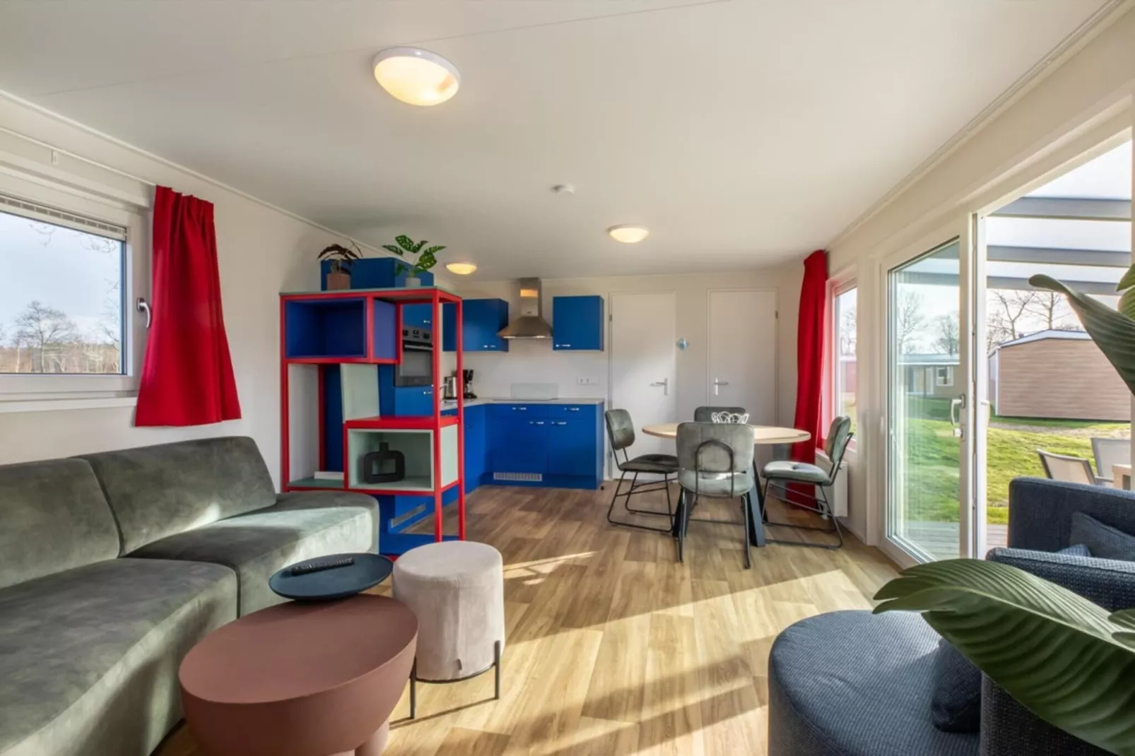 Chalet - Camping de Duinhoeve 'Bosdier'-Woonkamer