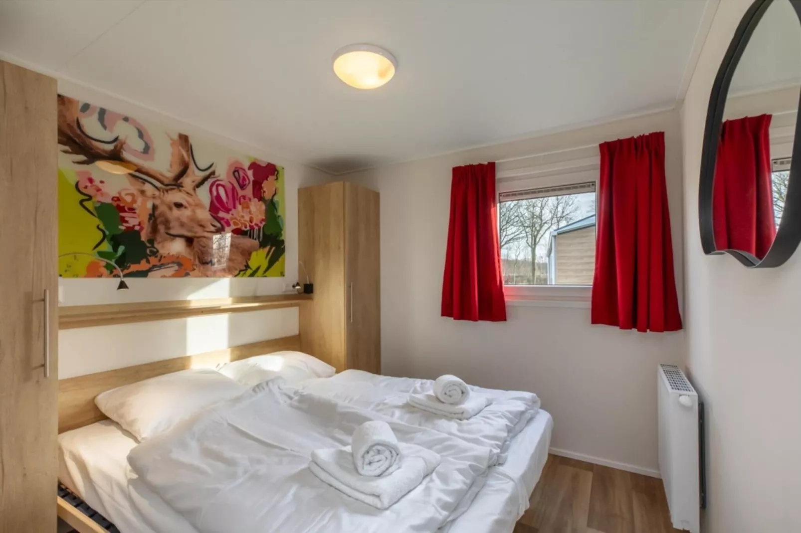 Chalet - Camping de Duinhoeve 'Bosdier'-Slaapkamer