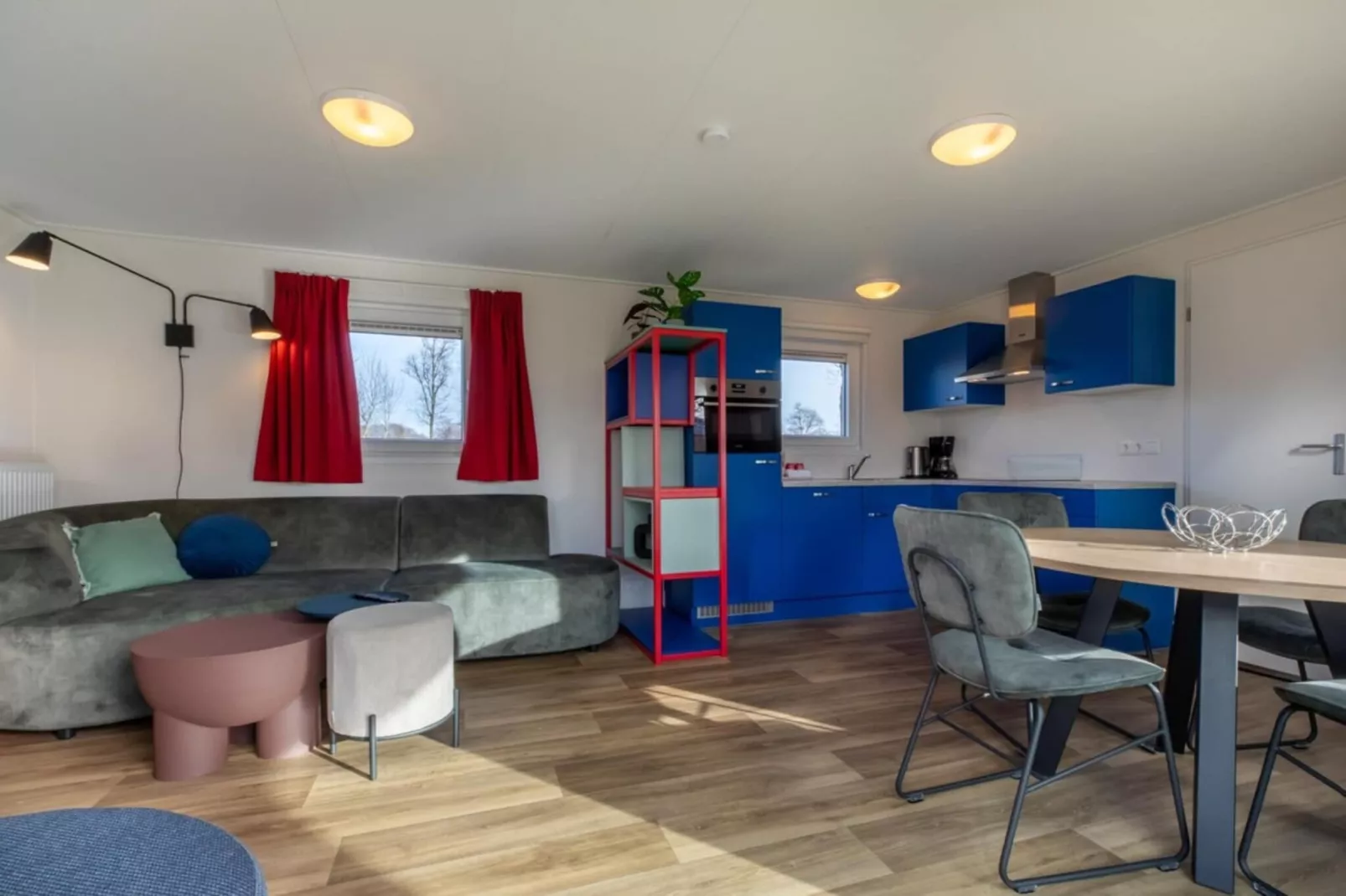 Chalet - Camping de Duinhoeve 'Bosdier'-Woonkamer