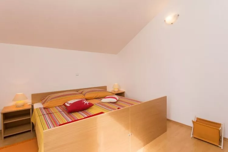Apartments Villa Maslina - Two Bedroom Apartment with Terrace and Garden View-Slaapkamer