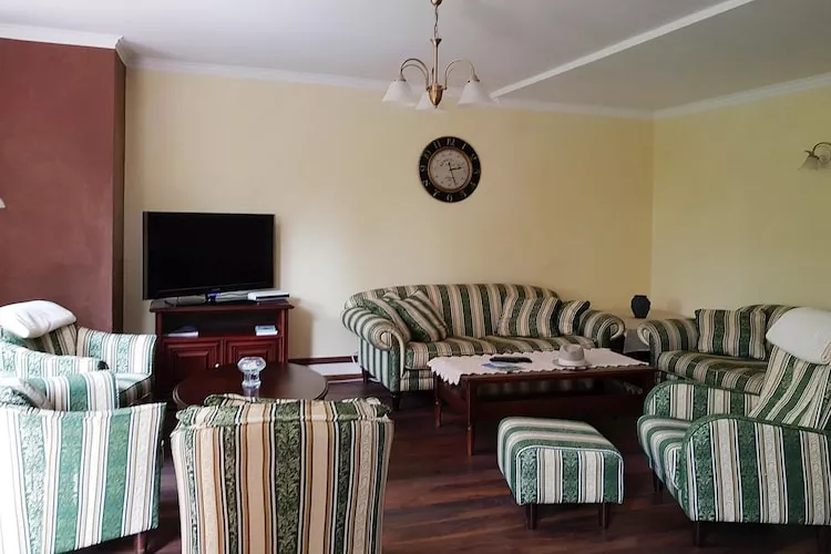 Luksusowy dom wakacyjny dla 10 osób w Trzęsaczu-Woonkamer