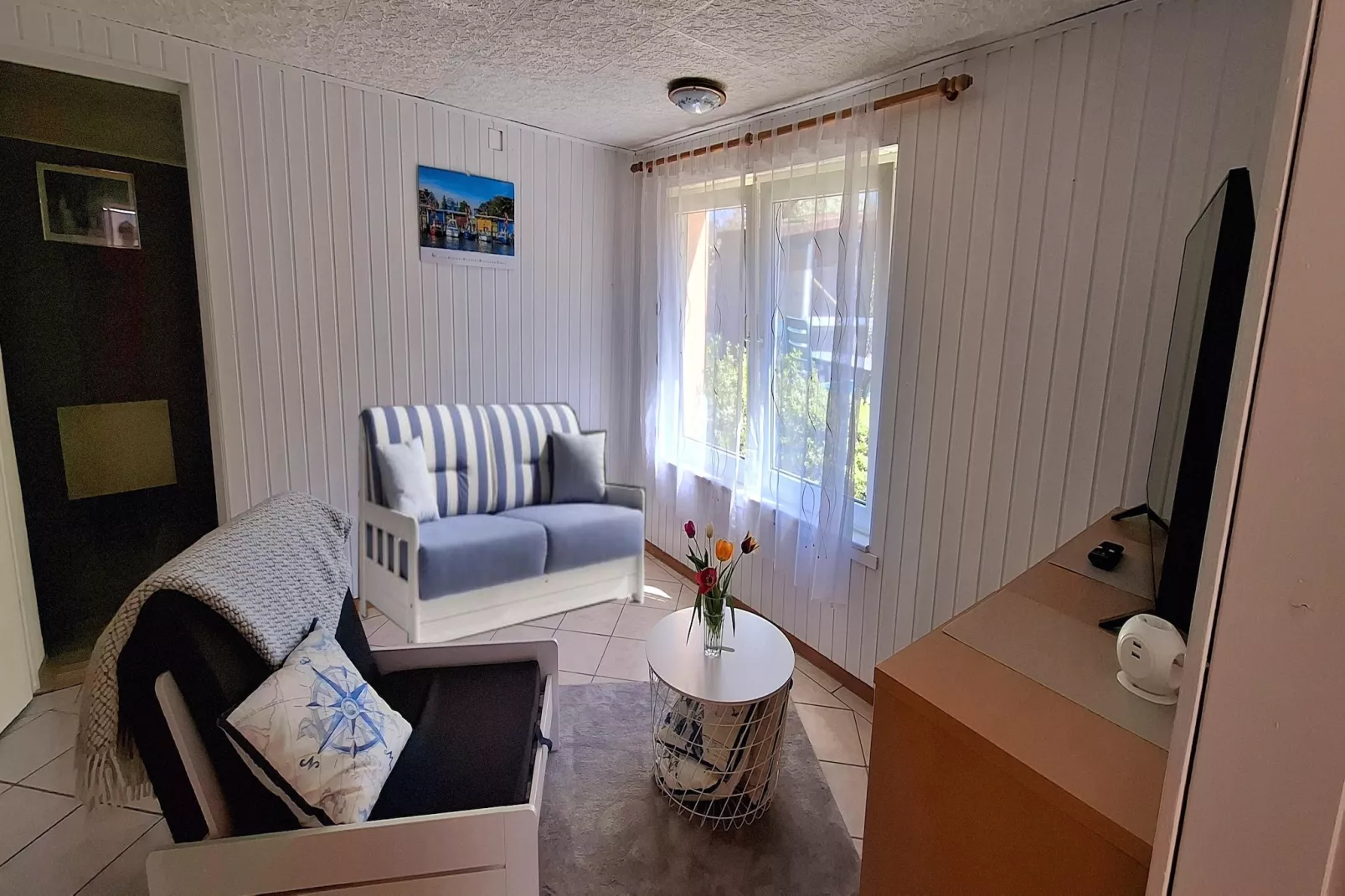 Ferienbungalow Kröpelin-Woonkamer