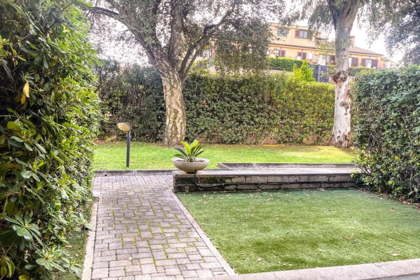 Bilocale vista giardino 105-Tuinen zomer