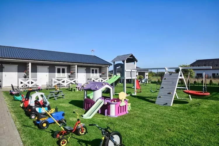 	Parterowe domki wakacyjne dla 5 osób Sarbinowo-Tuinen zomer