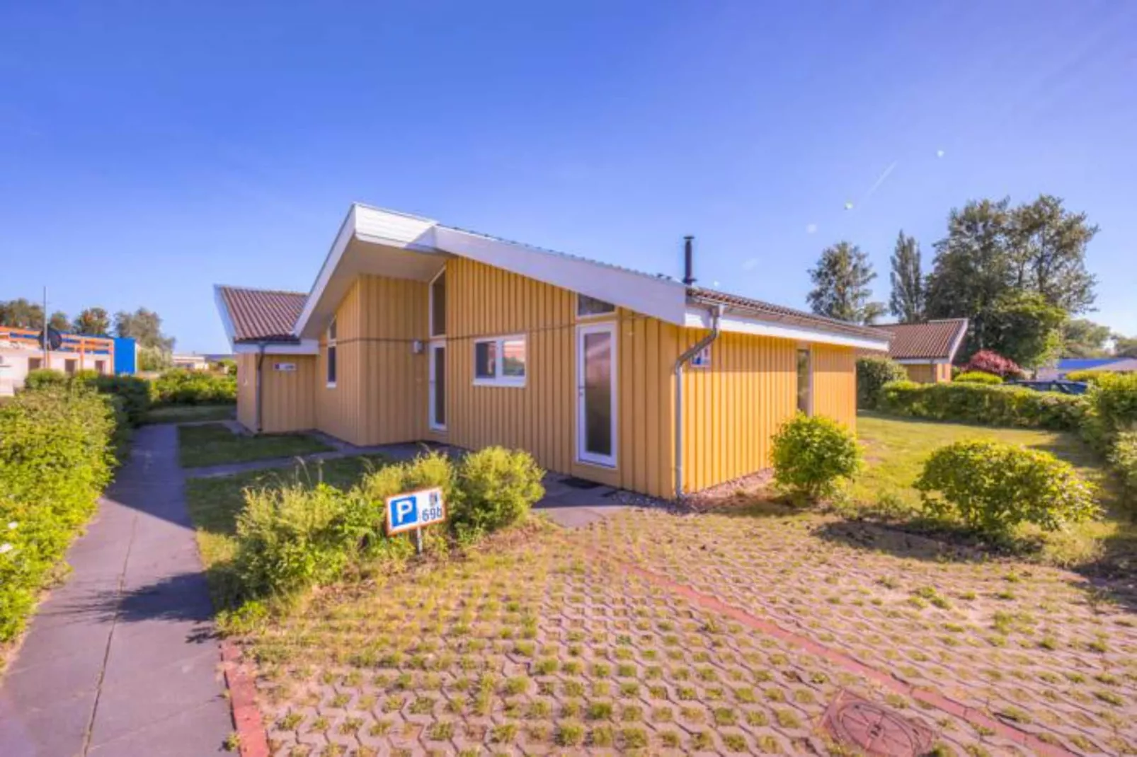 Ferienhaus Seeschwalbe-69a-Buitenkant zomer