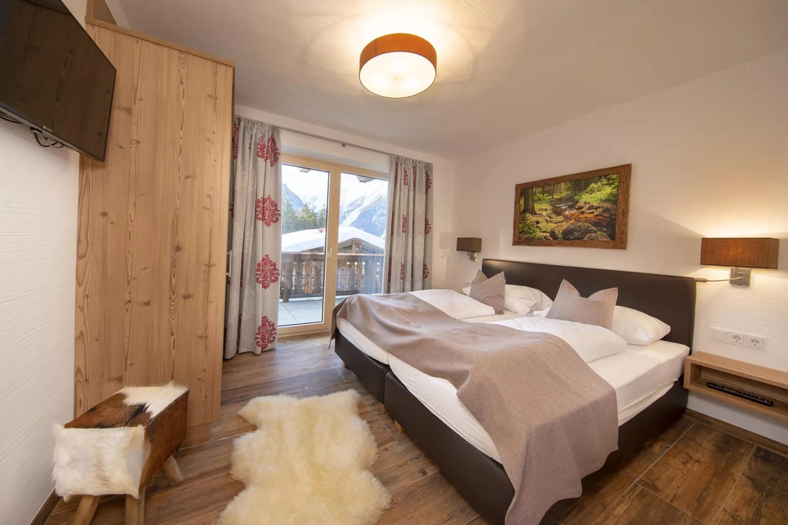 Nationalpark Chalet Stein am Ferner-Slaapkamer