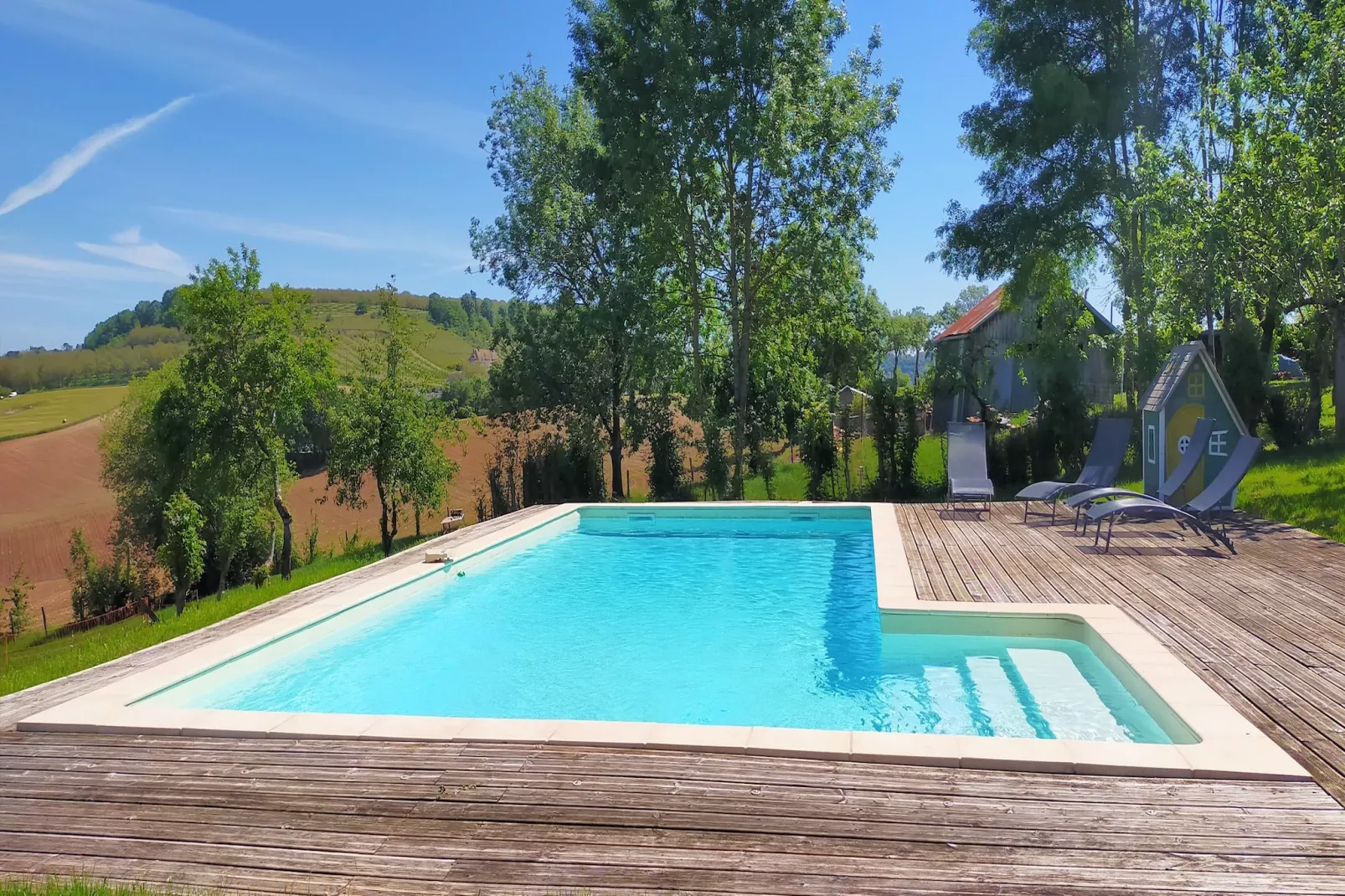 Maison de charme avec piscine à Coubejours-Zwembad