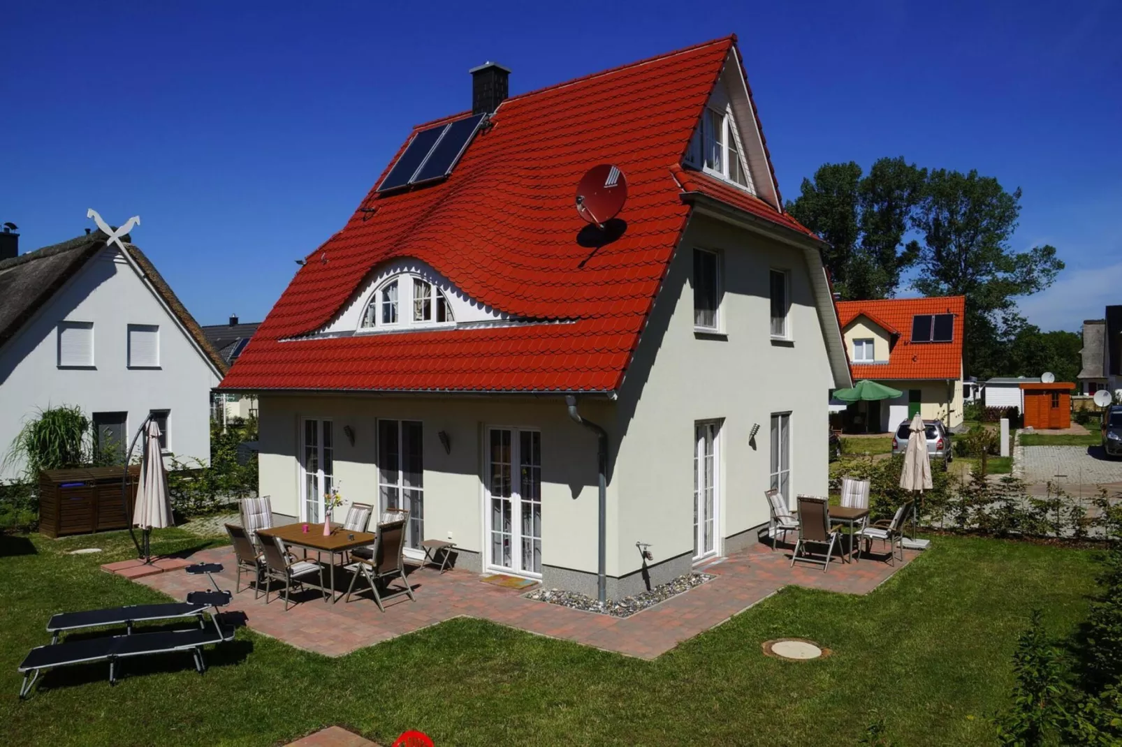 Ostseeresort Dampland-Reihenhaus Normalpreis-Buitenkant zomer