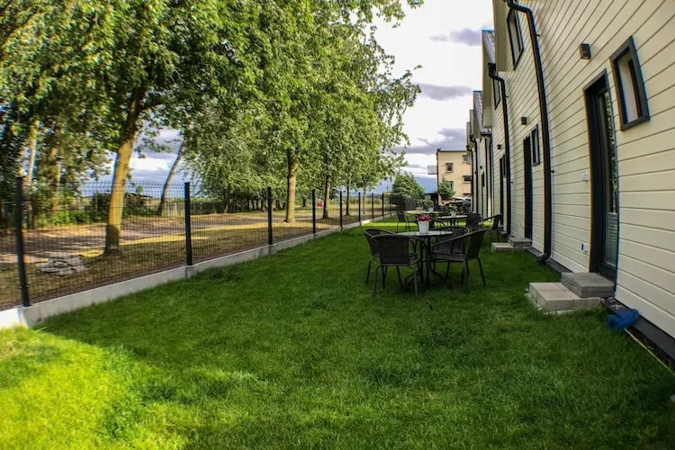 Piętrowe domki wakacyjne Mielno-Tuinen zomer