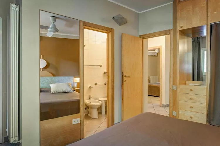 Holiday resort Riva degli Etruschi San Vincenzo-Ville Comfort  Trilo-SANGIOVETO 200 m dal mare-Slaapkamer