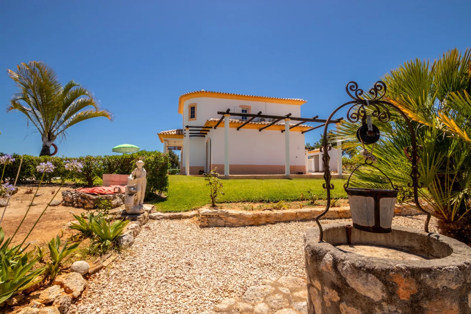Villa Muriwai-Tuinen zomer