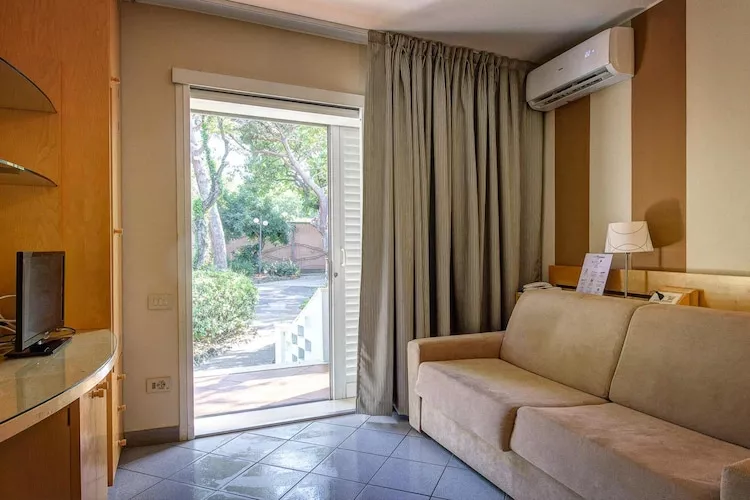 Holiday resort Riva degli Etruschi San Vincenzo-Ville Comfort  Trilo-SANGIOVETO 200 m dal mare-Woonkamer