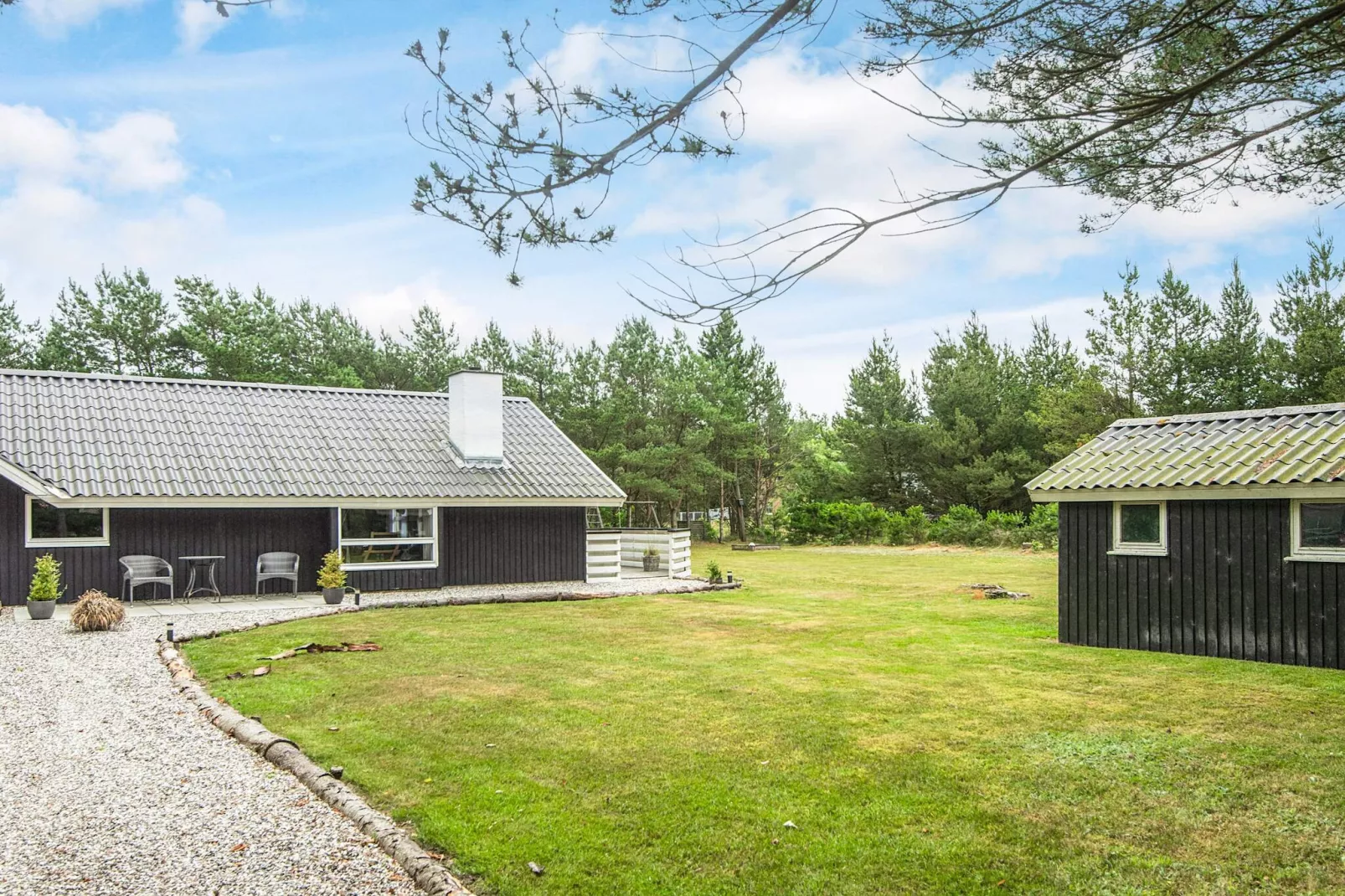 Lichte huisje met overdekt terras-By Traum-Uitzicht
