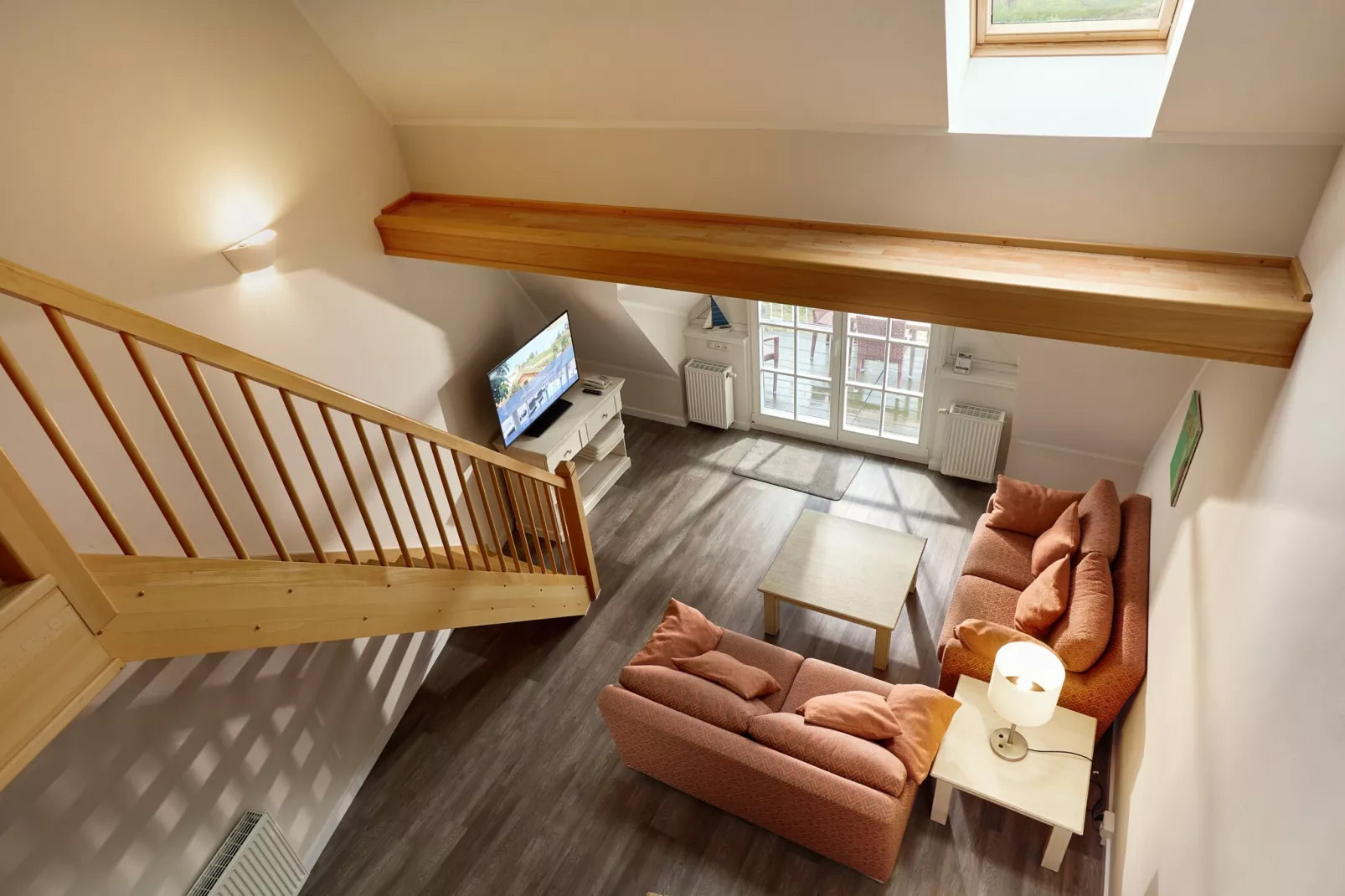 Garten-Maisonette Ferienwohnung - Strandhotel Dünenmeer-Woonkamer