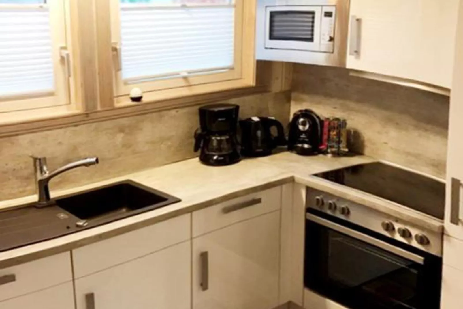 FH Wildgans Comfort mit Sauna & Kaminofen 81 qm 77-Keuken