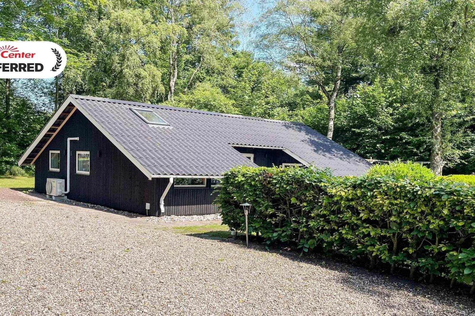 Familiehuisje met terras en gazon