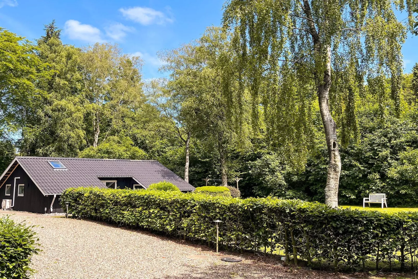 Familiehuisje met terras en gazon