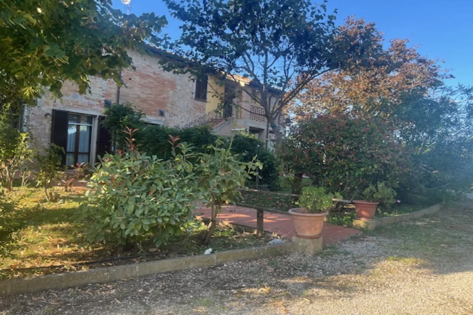 Appartamento Casale dei Girasoli-Tuinen zomer