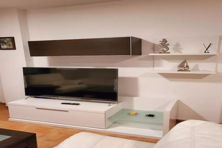 CT 347 AL - Faro's Gardenapartment - Valle del Este-Woonkamer