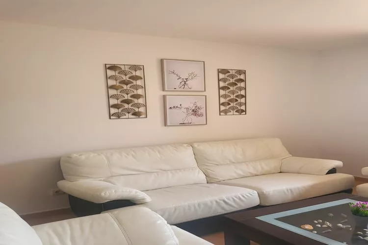 CT 347 AL - Faro's Gardenapartment - Valle del Este-Woonkamer