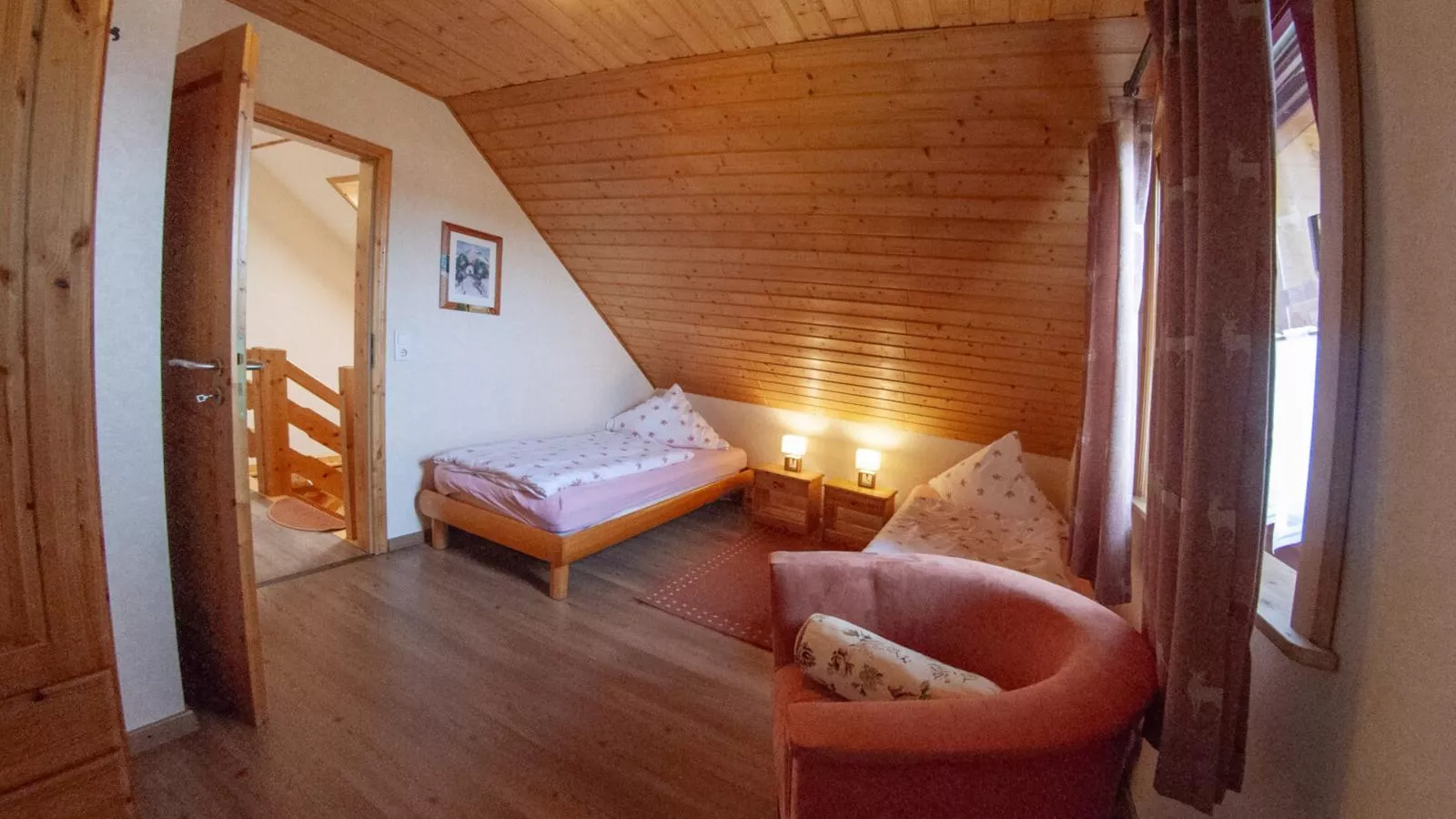 Naturstammhaus-Slaapkamer