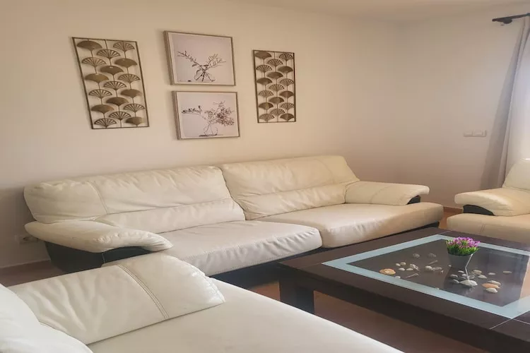 CT 347 AL - Faro's Gardenapartment - Valle del Este-Woonkamer