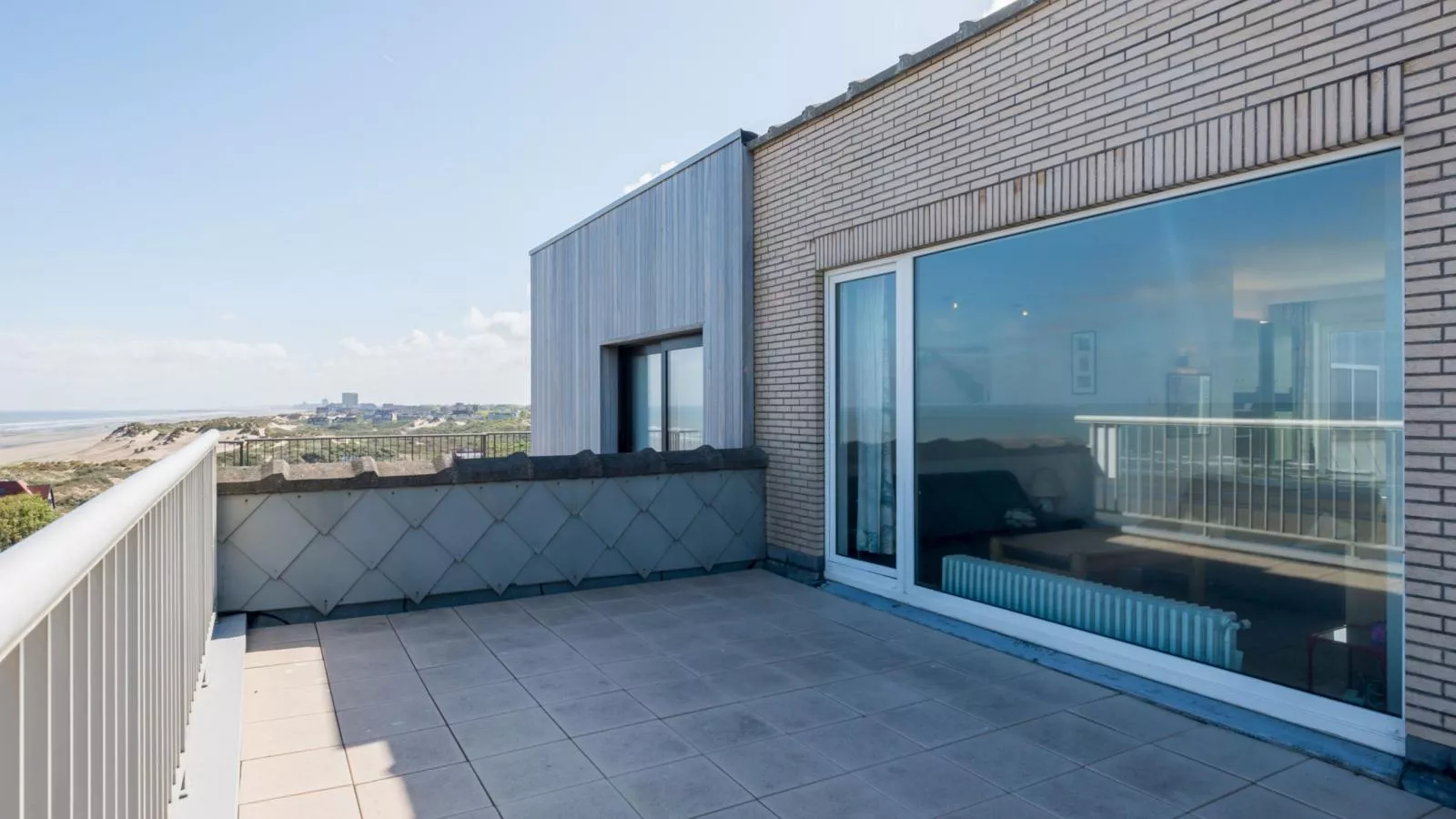 Zeezicht 7e-Terrasbalkon