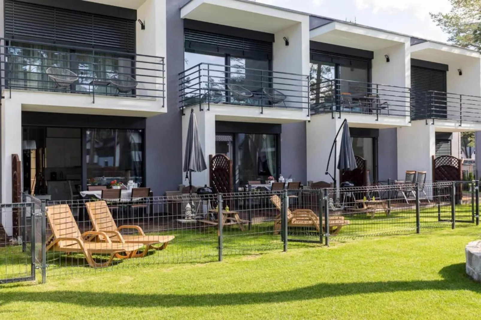 Domy szeregowe z dostępem do basenu Pobierowo-Buitenkant zomer