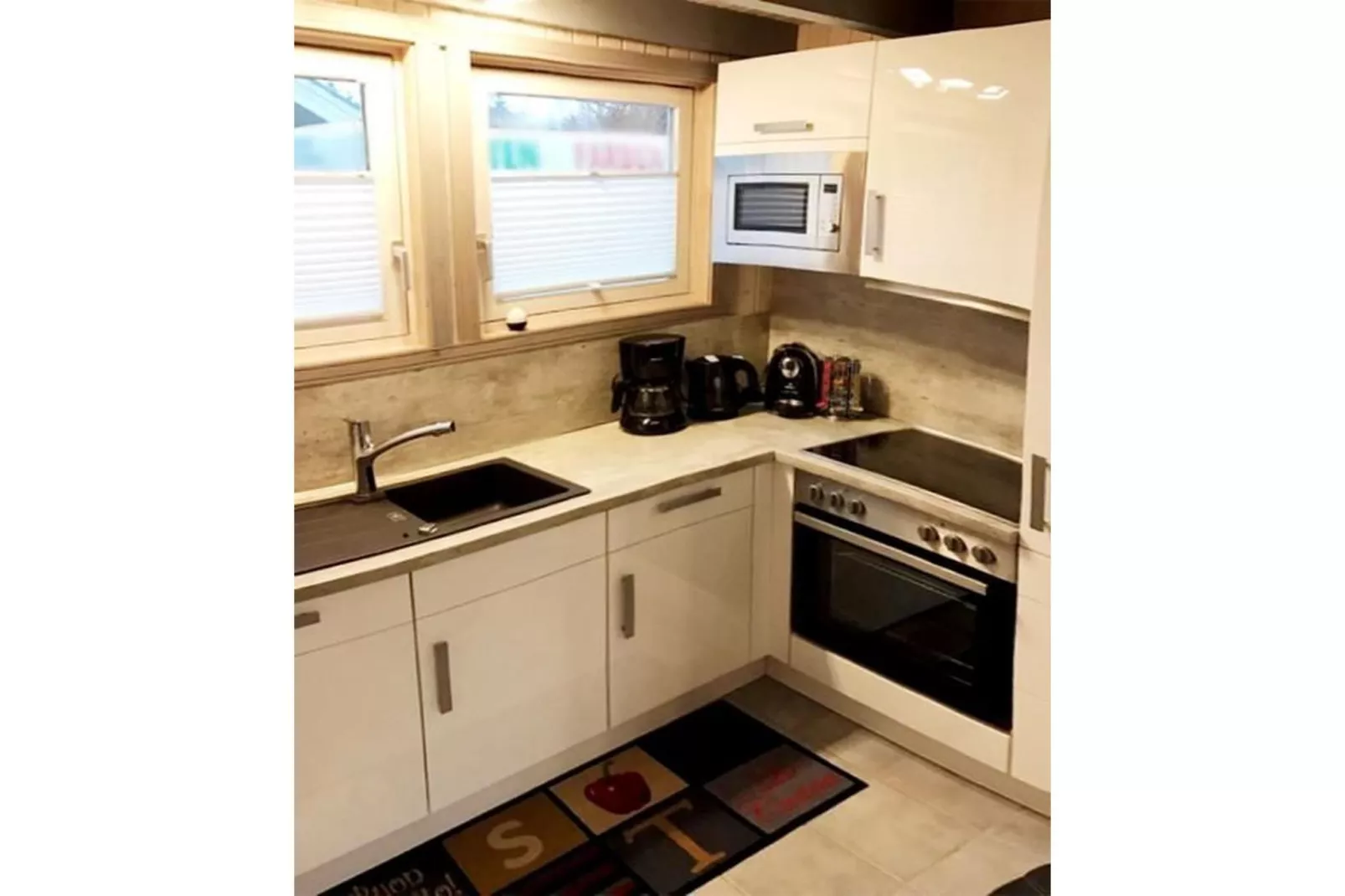 FH Wildgans Comfort mit Sauna & Kaminofen 81 qm 77-Keuken