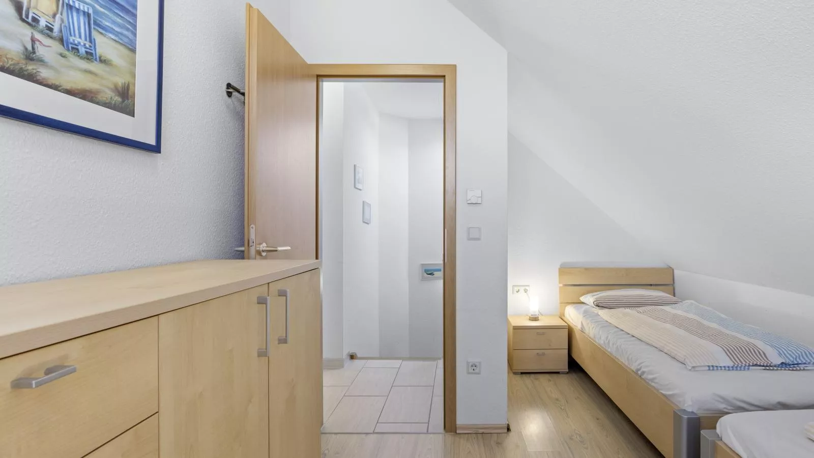 Windflüchter links mit Sauna-Slaapkamer