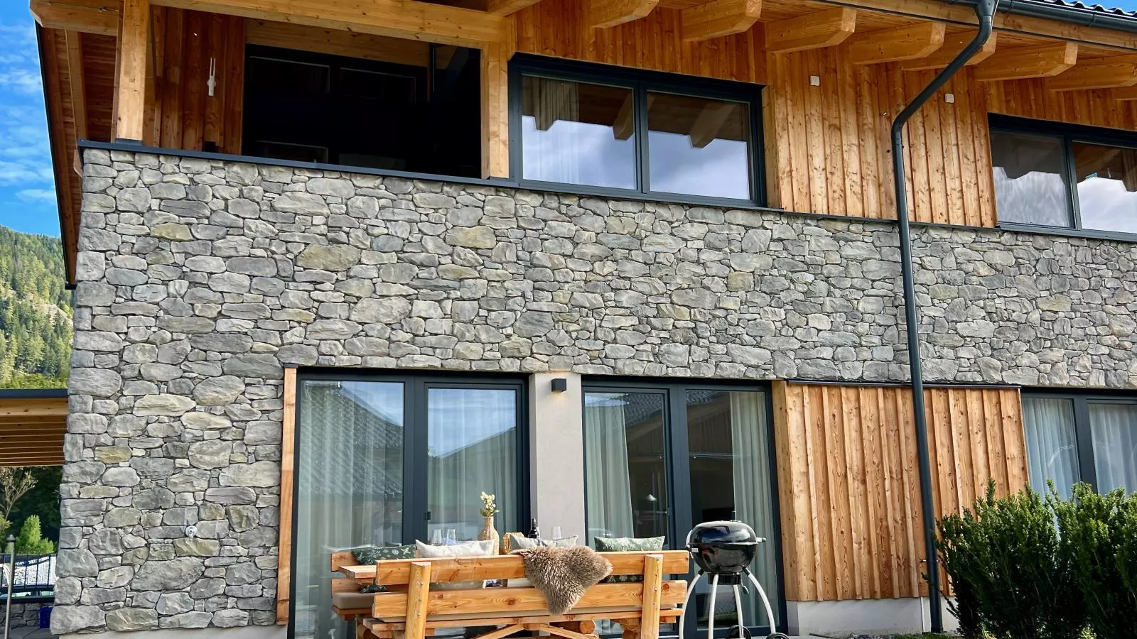 Almchalet Alpenglück-Buitenkant zomer