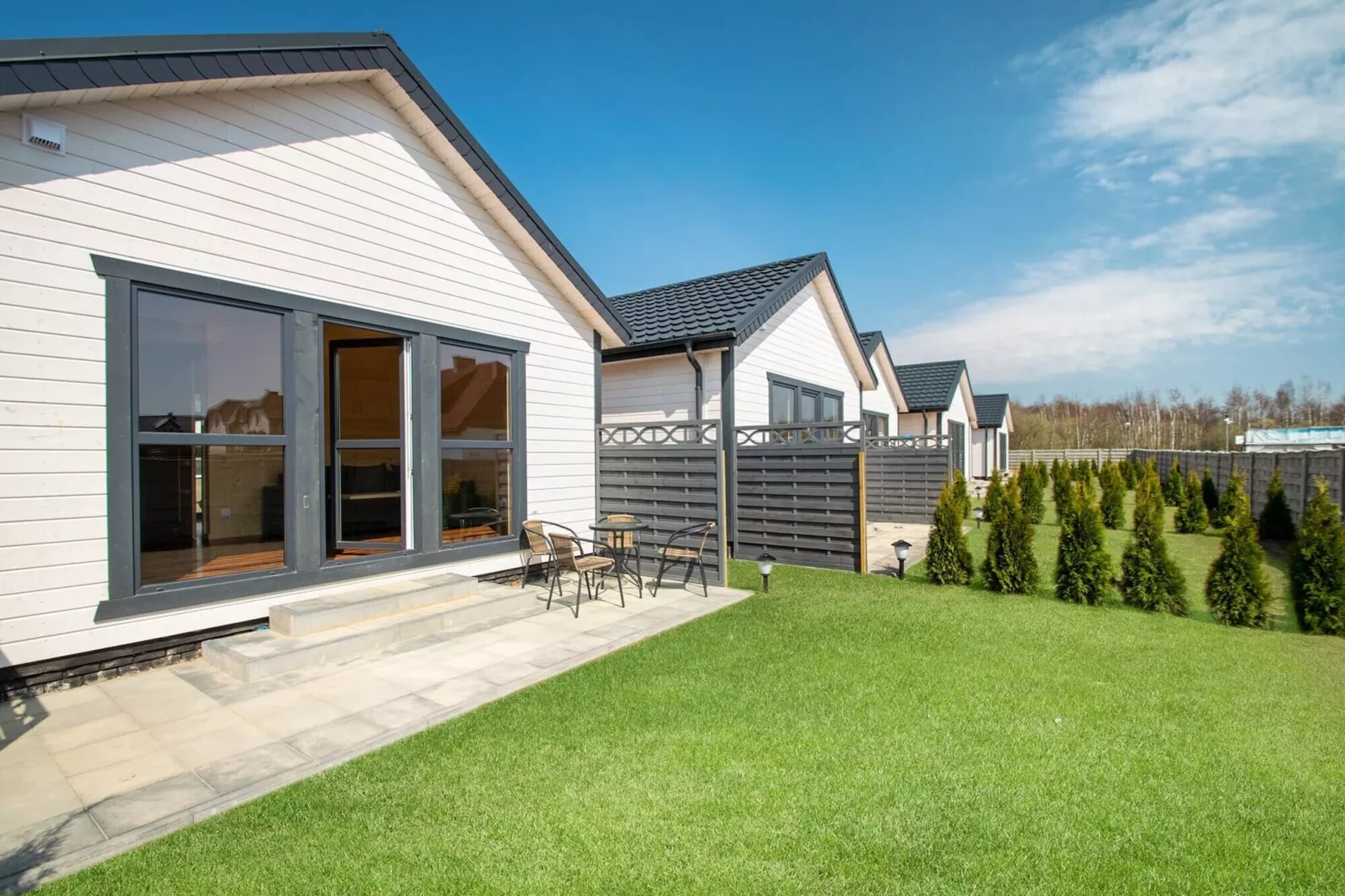 Domki wakacyjne dla 4 osób Łazy-Buitenkant zomer