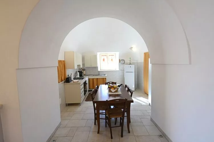 Holiday home Cisternino-Trullo Ulivo Antico-Eetkamer